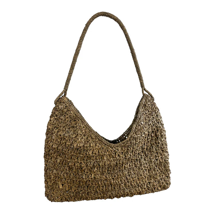 Valiha Bag van Made in Mada, handgeweven raffia tas met gehaakt bloemenpatroon